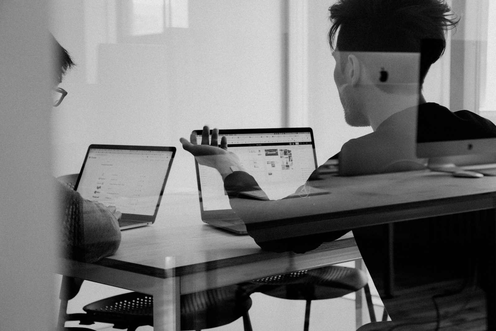 Business advisors reviewing documents in a meeting