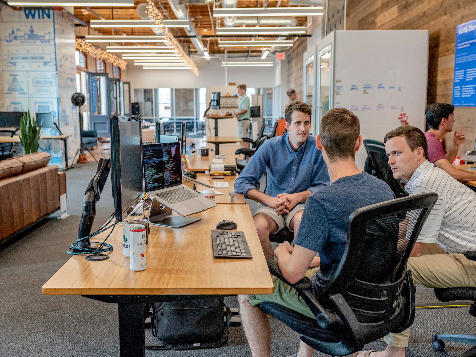 A small business team working together in an open office